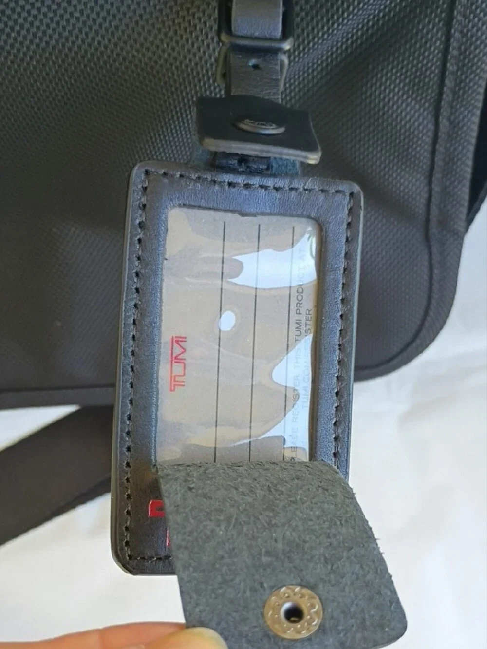 Tumi Black Nylon Messenger with Red Logo Accent